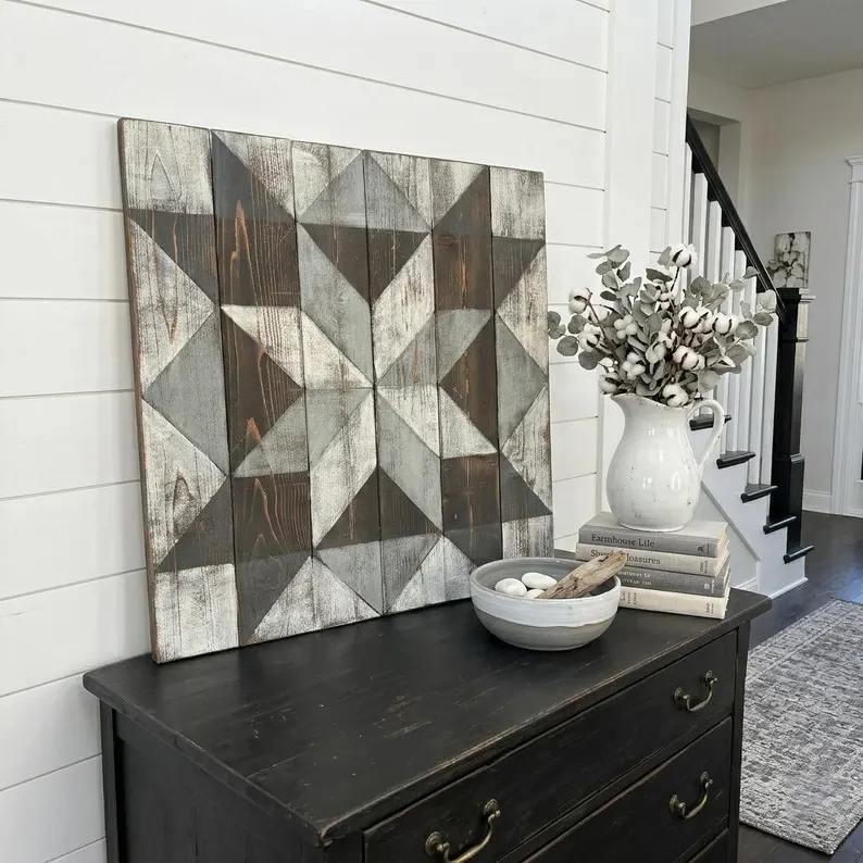 Hand-painted custom barn quilts displayed indoors in Murfreesboro TN farmhouse